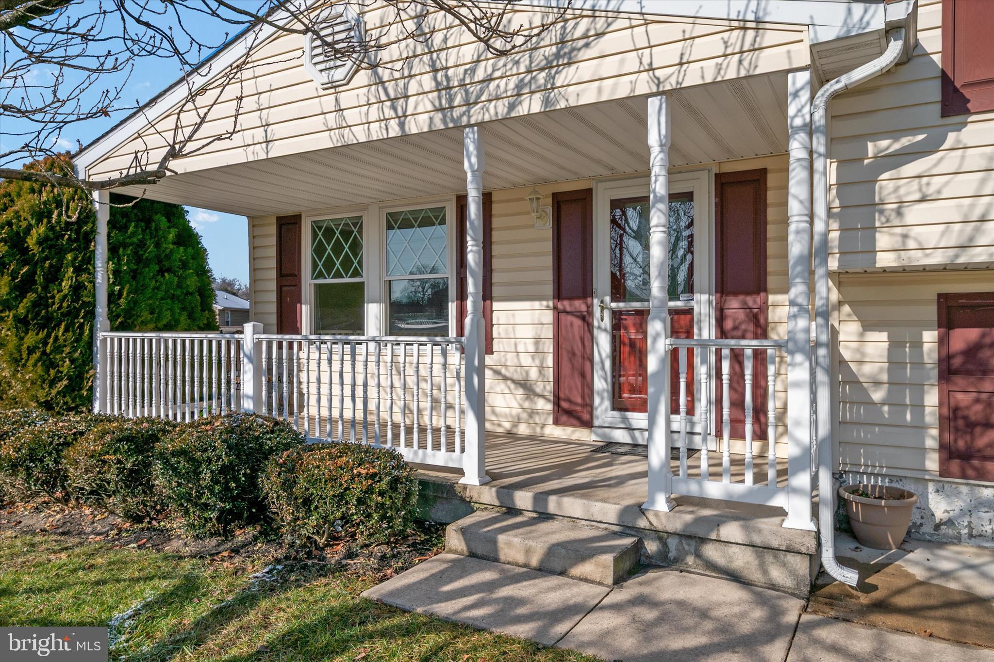 226 Compass Road Baltimore, MD 21221 - Photo 4 of 35 a view of a house with a small yard and wooden floor and fence