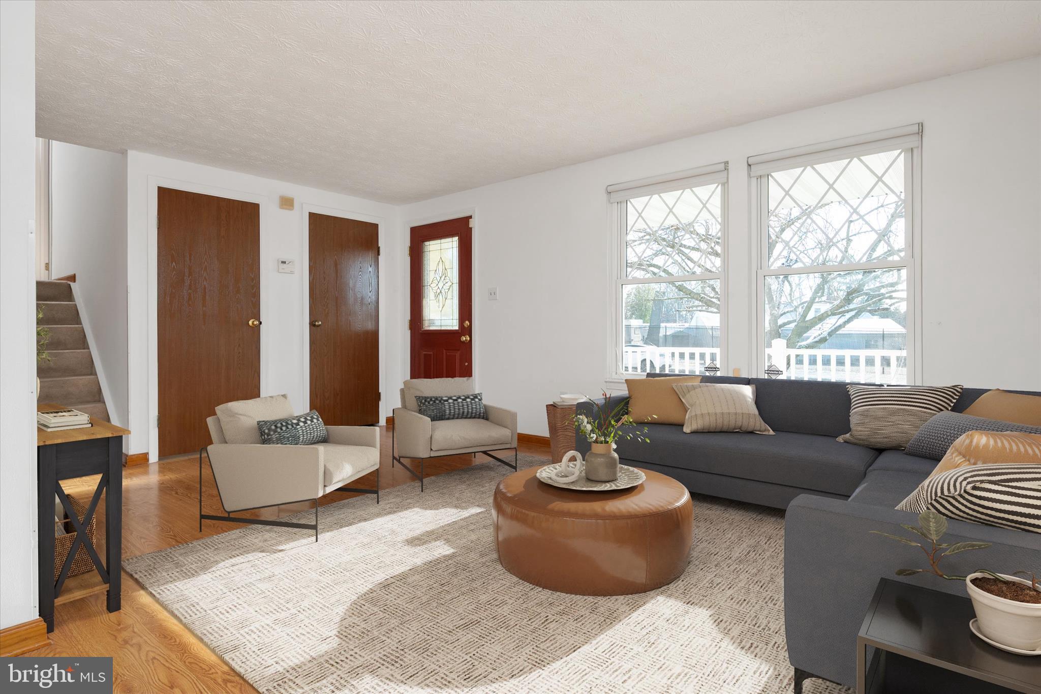 226 Compass Road Baltimore, MD 21221 - Photo 6 of 35 a living room with furniture and a large window