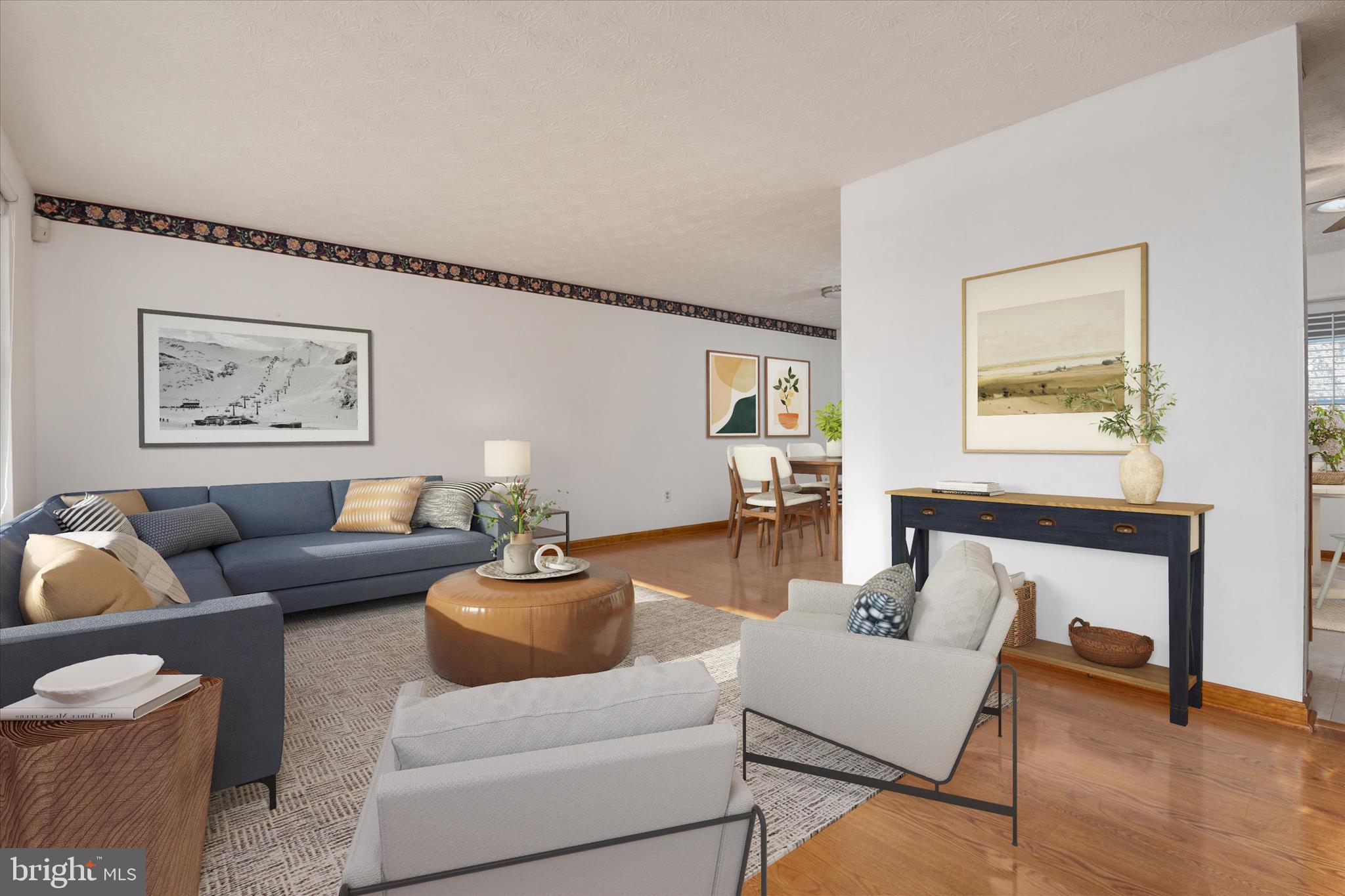 226 Compass Road Baltimore, MD 21221 - Photo 7 of 35 a living room with furniture and a wooden floor