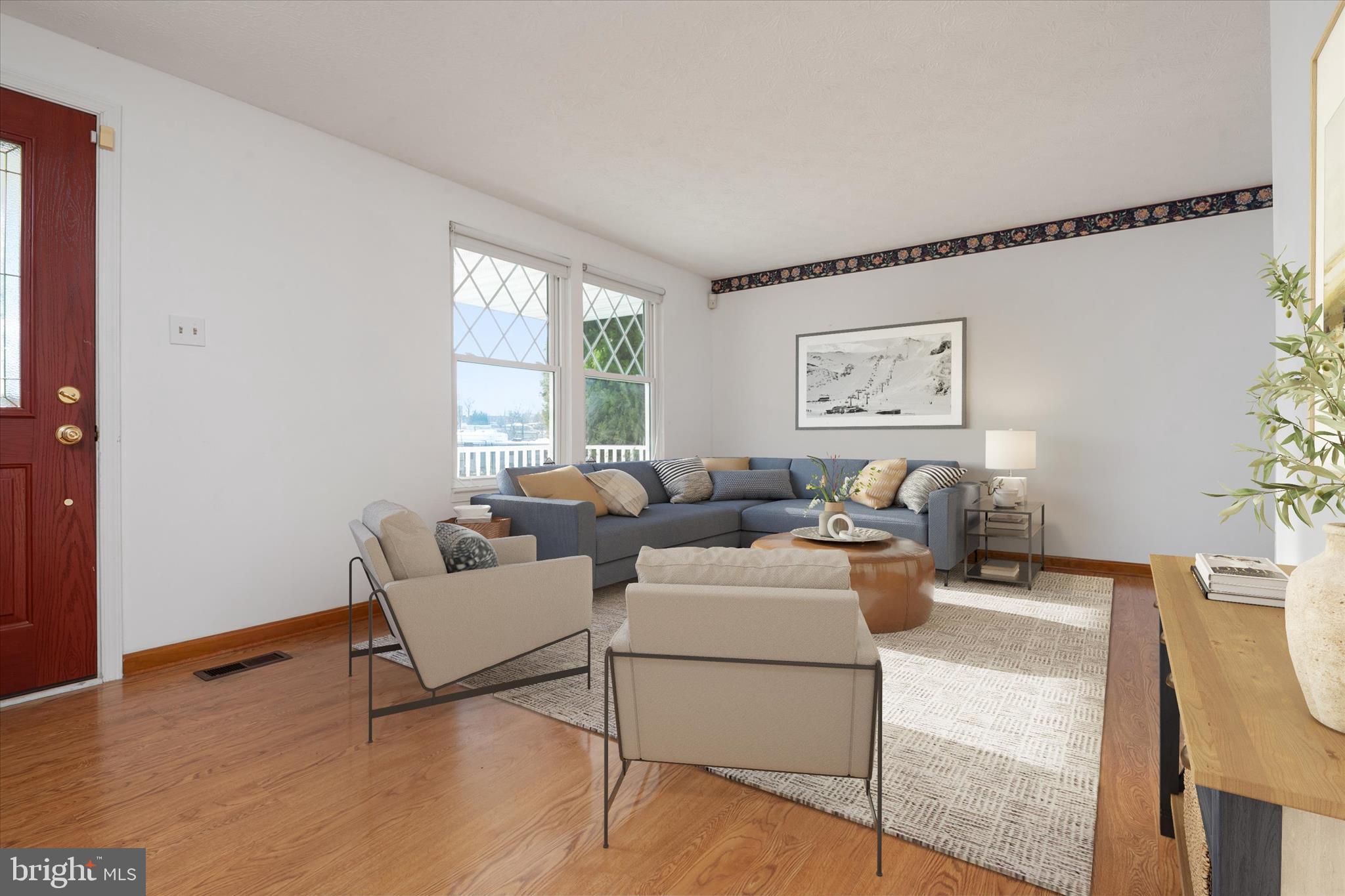 226 Compass Road Baltimore, MD 21221 - Photo 8 of 35 a living room with furniture and a large window