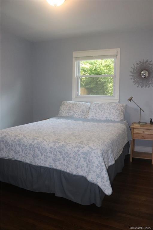 1100 Norland Road Charlotte, NC 28205 - Photo 9 of 13 a bedroom with a bed and window