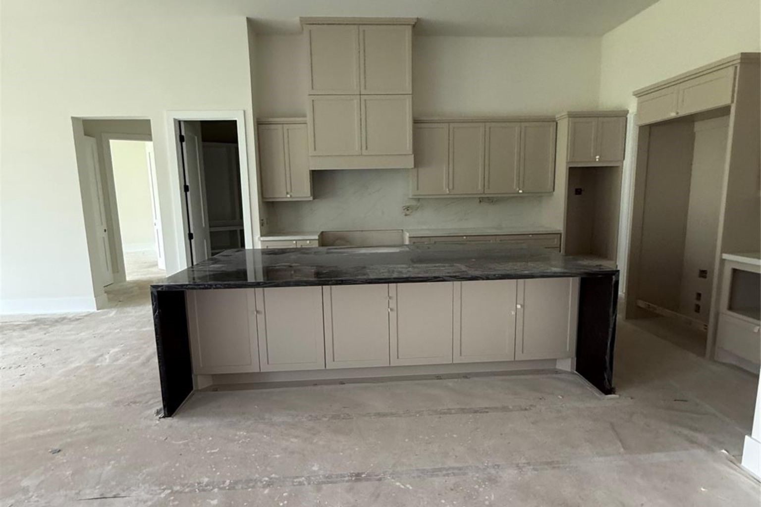 65 Shadow Creek Ridge Drive Spring, TX 77389 - Photo 7 of 44 a kitchen with stainless steel appliances granite countertop a refrigerator and a granite counter tops