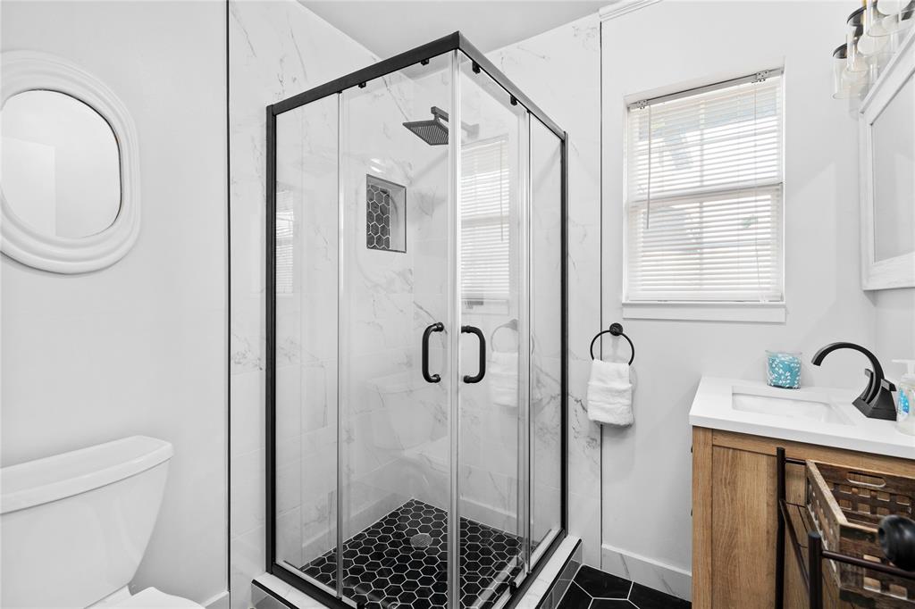 2806 North Ricketts Street Sherman, TX 75092 - Photo 14 of 24 Full bath featuring vanity and a marble finish shower