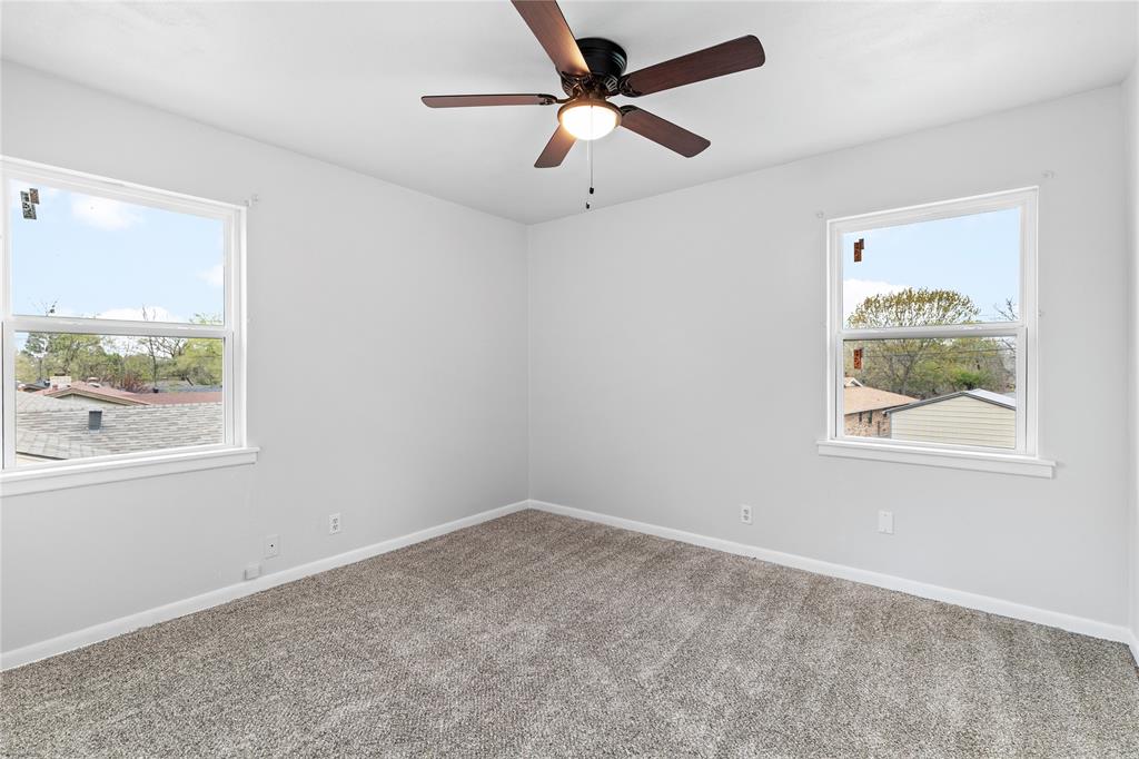 2806 North Ricketts Street Sherman, TX 75092 - Photo 20 of 24 Spare room with carpet and ceiling fan