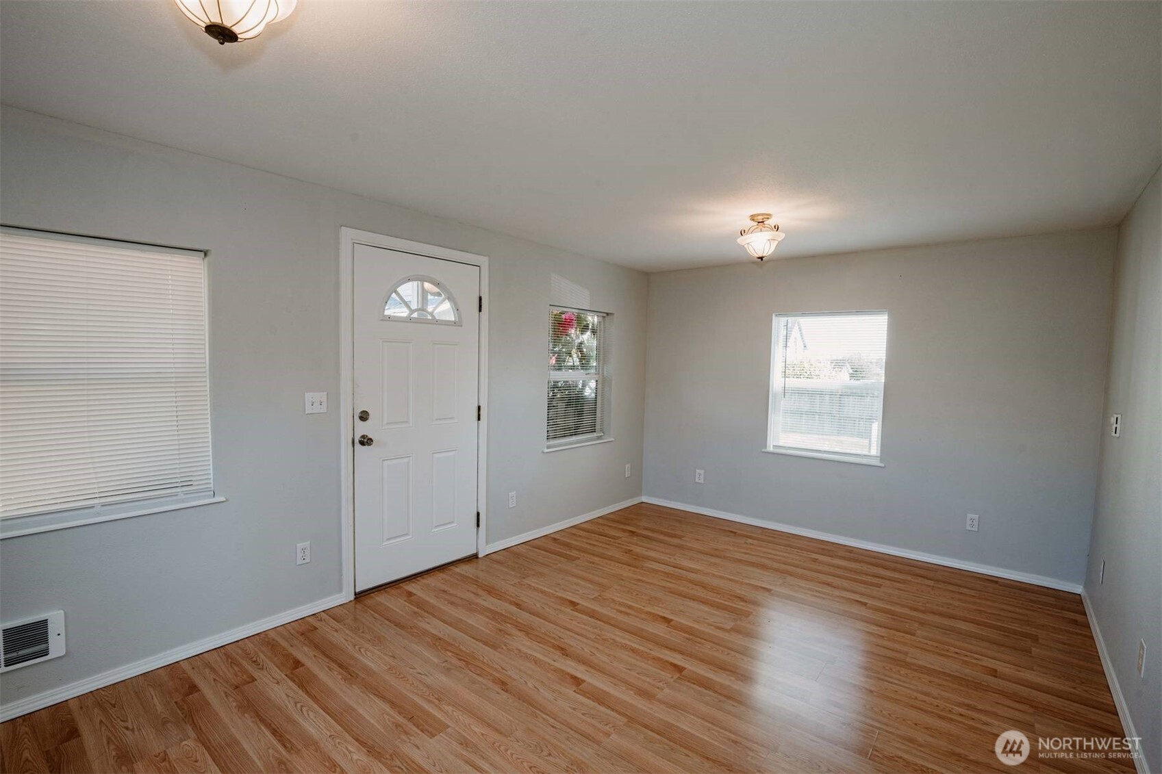 2220 Summit Avenue Everett, WA 98201 - Photo 17 of 26 wooden floor in an empty room with a window
