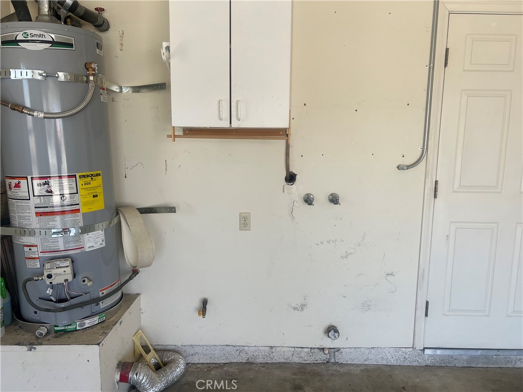 26682 Mainsail Lane Helendale, CA 92342 - Photo 12 of 13 a bathroom with a granite countertop sink and a mirror