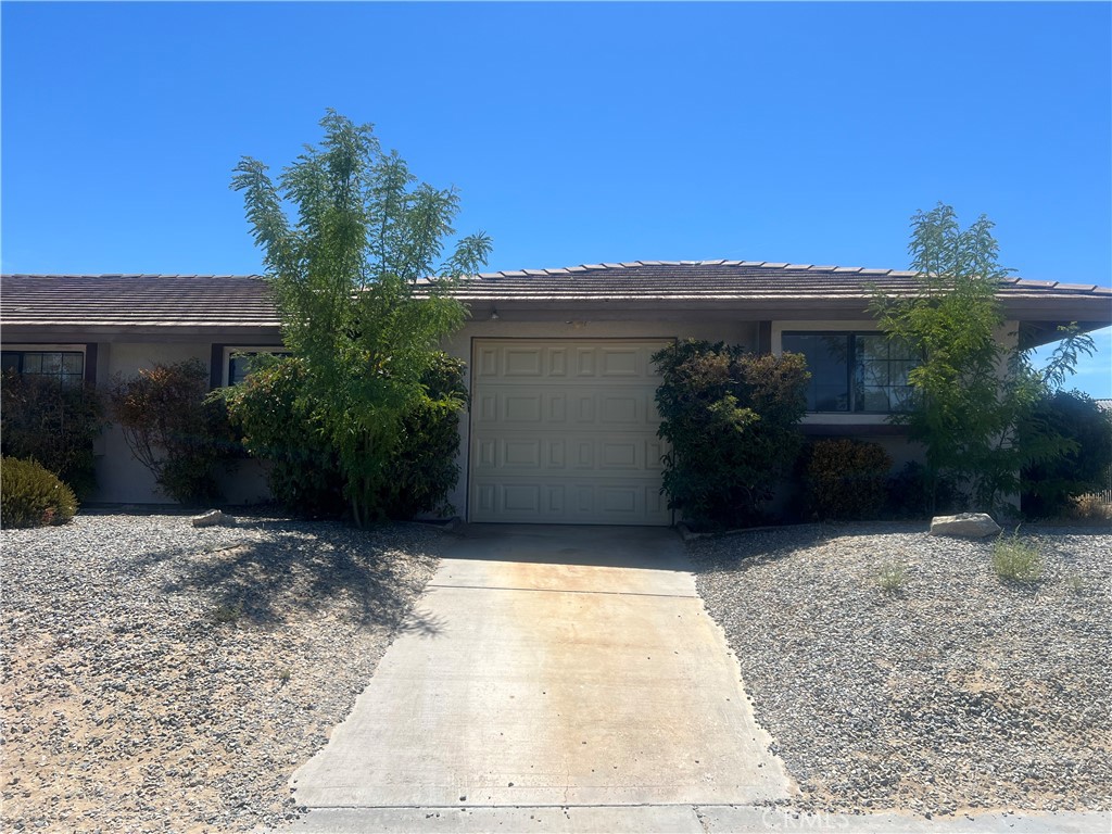 26682 Mainsail Lane Helendale, CA 92342 - Photo 3 of 13 a view of a house with a yard