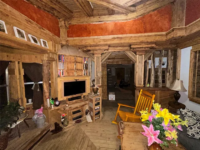 a view of a garage with the tv