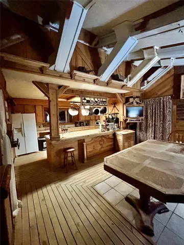 a view of a swimming pool with seating area