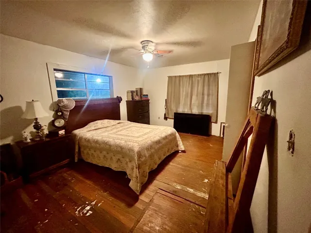 a bedroom with a bed and a walk in closet