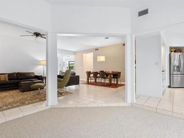 a living room with furniture and a couch