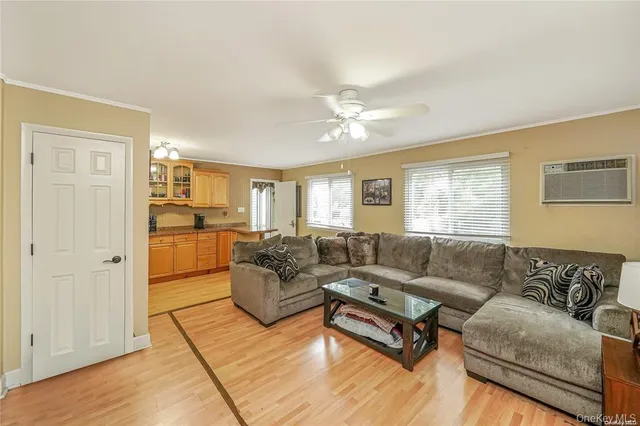 a living room with furniture and a window