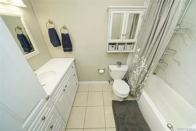 a bathroom with a toilet and a sink