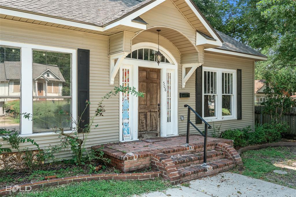 508 Chandler Street Minden, LA 71055 - Photo 7 of 35 a front view of a house with garden