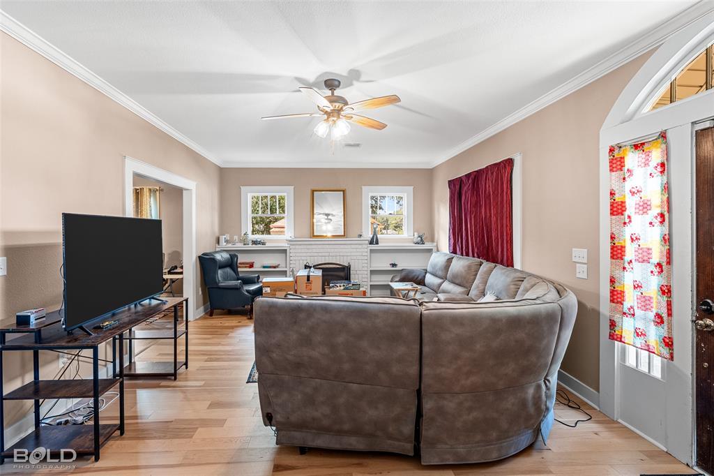 508 Chandler Street Minden, LA 71055 - Photo 10 of 35 a living room with furniture and a flat screen tv