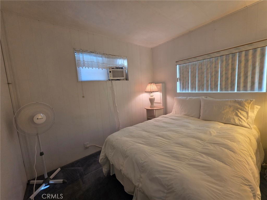 20806 Gridley Road, Unit 52 Lakewood, CA 90715 - Photo 14 of 51 a bedroom with a bed and a window