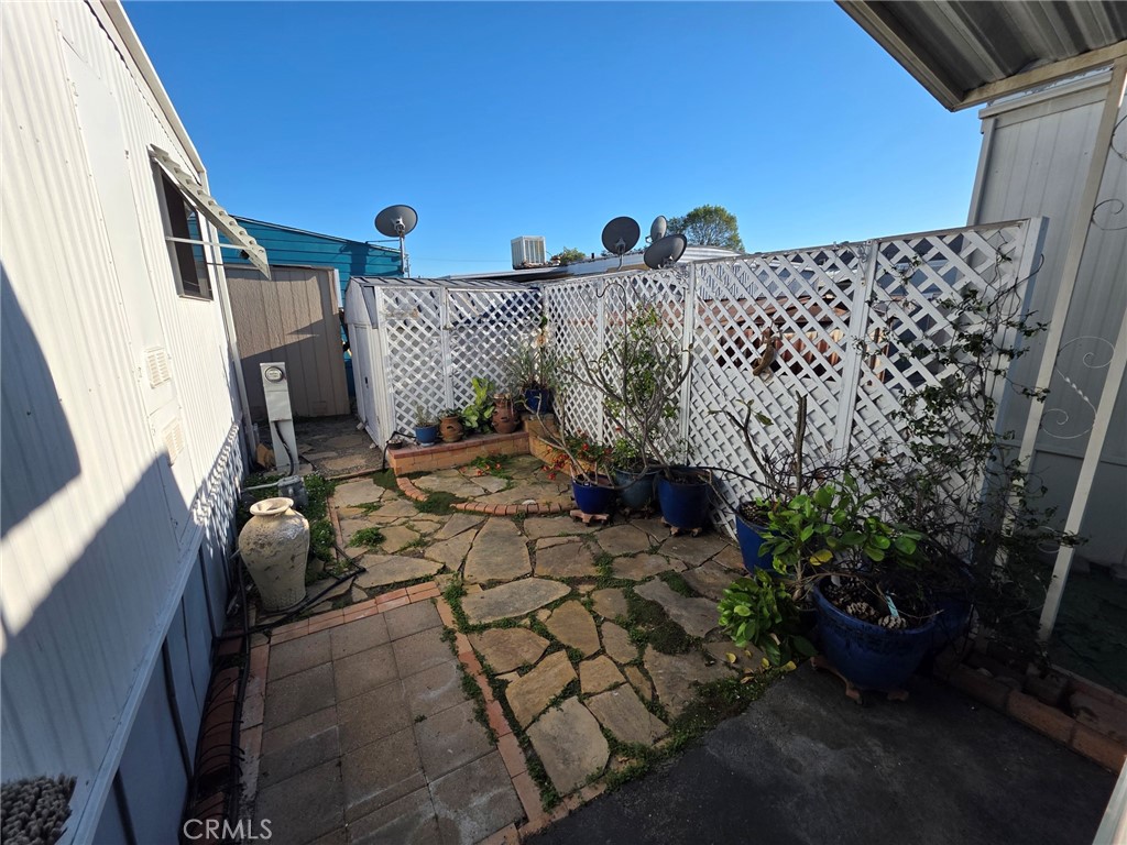 20806 Gridley Road, Unit 52 Lakewood, CA 90715 - Photo 16 of 51 a view of balcony and yard