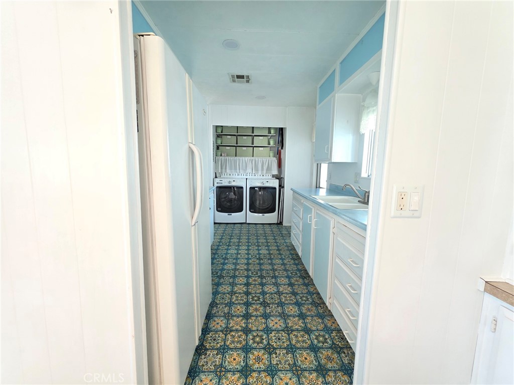 20806 Gridley Road, Unit 52 Lakewood, CA 90715 - Photo 28 of 51 a view of a hallway with windows