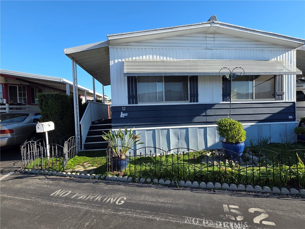 20806 Gridley Road, Unit 52 Lakewood, CA 90715 - Photo 4 of 51 a front view of a house