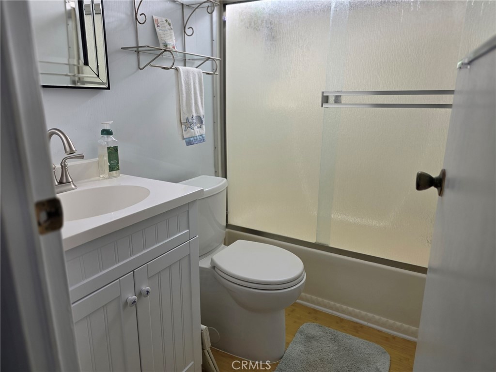 20806 Gridley Road, Unit 52 Lakewood, CA 90715 - Photo 41 of 51 a bathroom with a sink toilet and shower