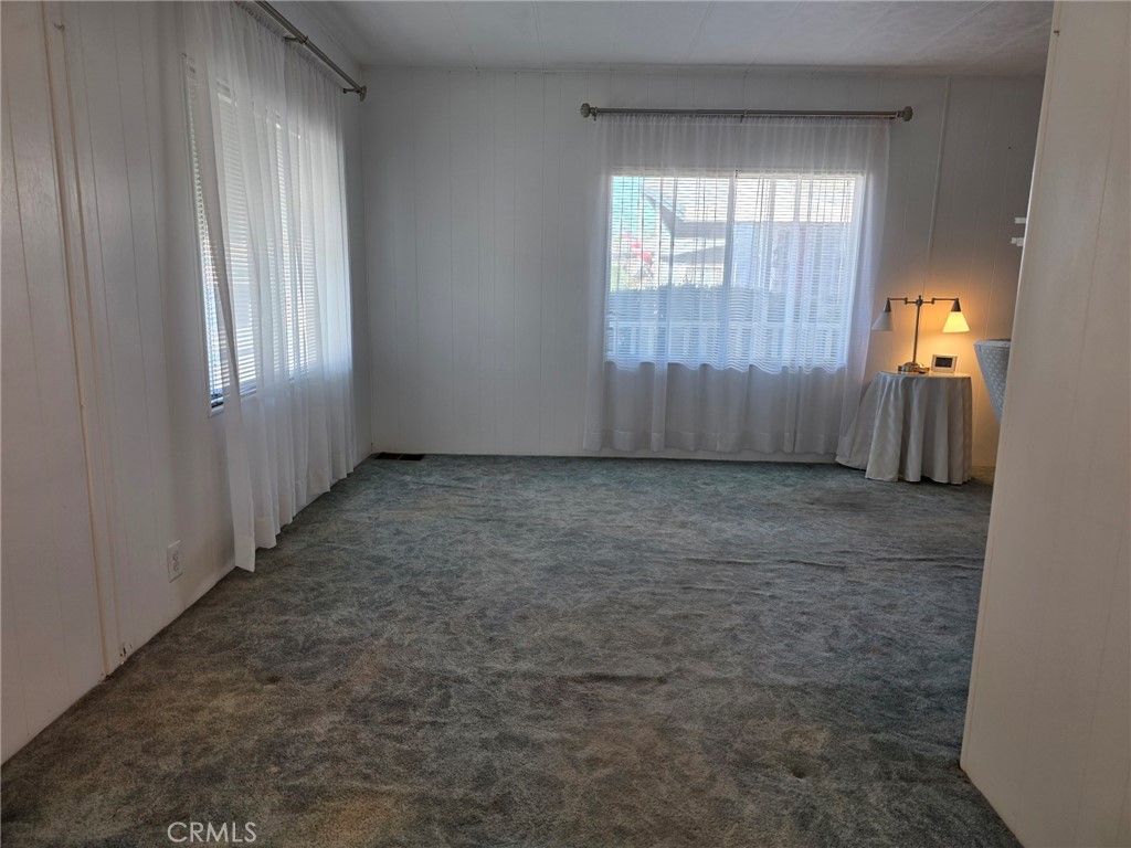 20806 Gridley Road, Unit 52 Lakewood, CA 90715 - Photo 42 of 51 an empty room with windows