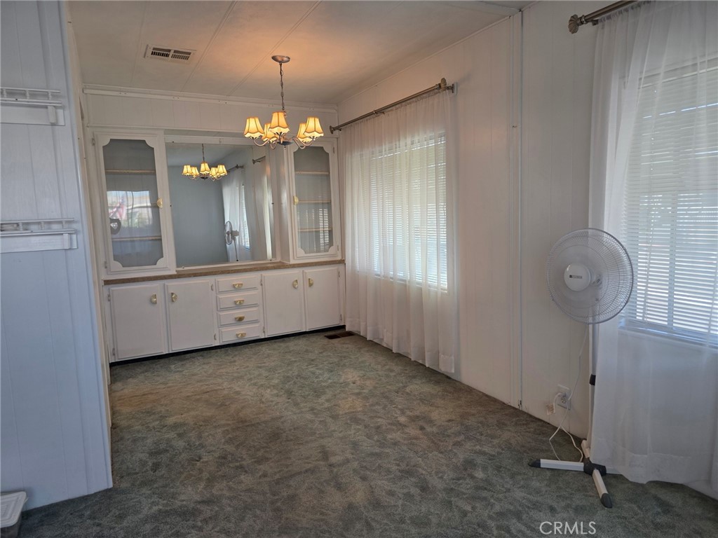 20806 Gridley Road, Unit 52 Lakewood, CA 90715 - Photo 47 of 51 a view of a chandelier in a room