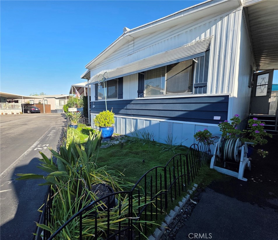 20806 Gridley Road, Unit 52 Lakewood, CA 90715 - Photo 7 of 51 a view of a backyard with plants