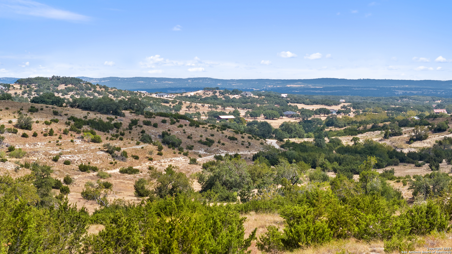 120 Falling Oak Trail Blanco, TX 78606 - Photo 3 of 15 an aerial view of residential building and trees around