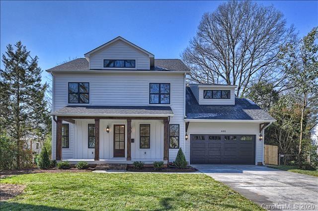 608 Marsh Road Charlotte, NC 28209 - Photo 1 of 31 a front view of a house with a yard and garage