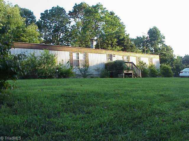 1334 Peter Mabe Road, Unit 1334 Danbury, NC 27016 - Photo 1 of 5 Exterior Front.