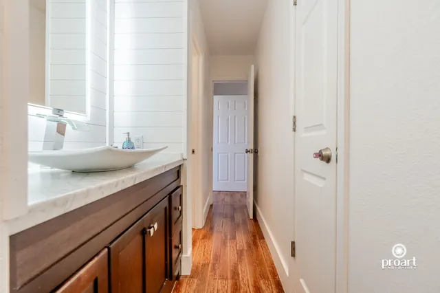 a bathroom with a sink and a mirror