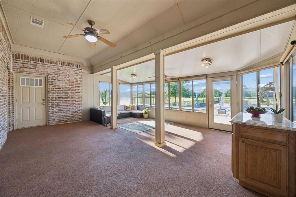 174 King Ranch Court Fort Worth, TX 76108 - Photo 13 of 40 Primary Home - Sunroom which is Heated and HVAC so can be used as 3rd Living Area for year round enjoyment.