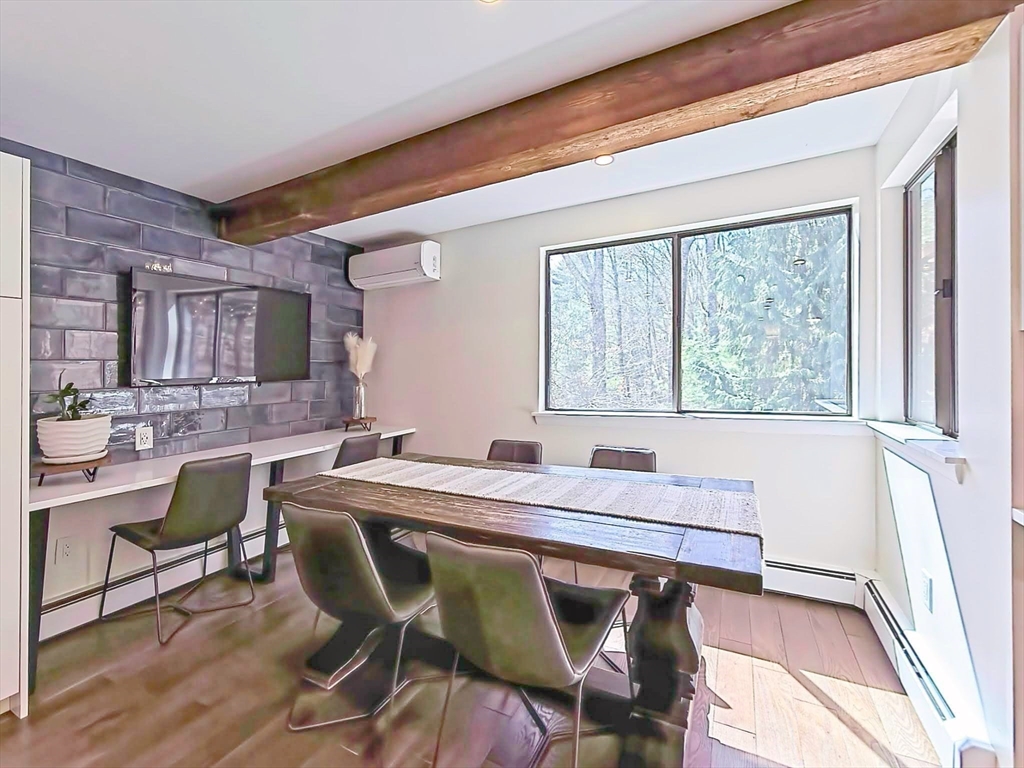 8 Fredrickson Road Norfolk, MA 02056 - Photo 25 of 39 a view of a dining room with furniture and window