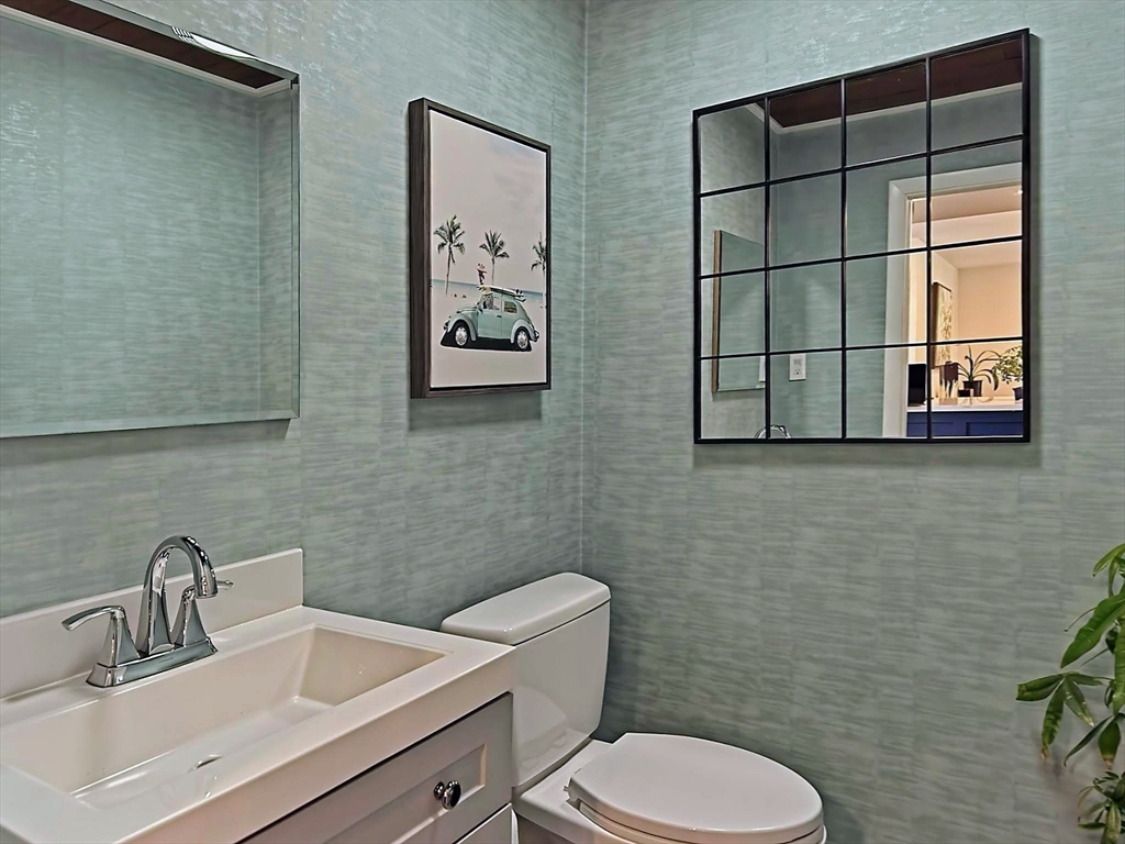 8 Fredrickson Road Norfolk, MA 02056 - Photo 27 of 39 a bathroom with a toilet sink and mirror