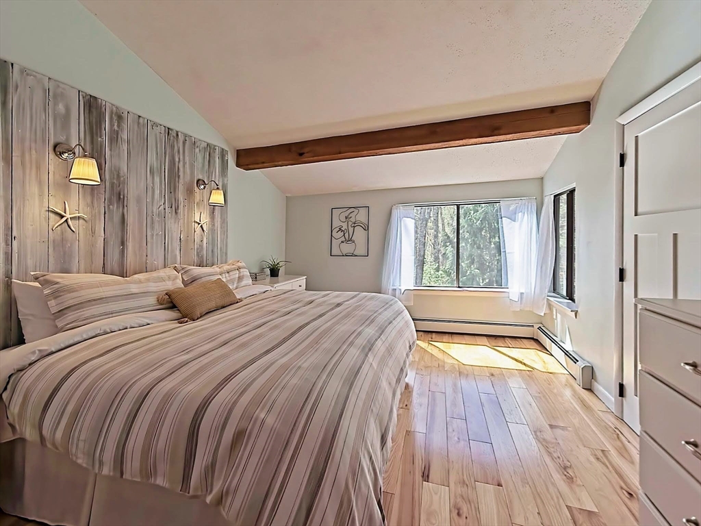 8 Fredrickson Road Norfolk, MA 02056 - Photo 28 of 39 a bedroom with a bed and a large window