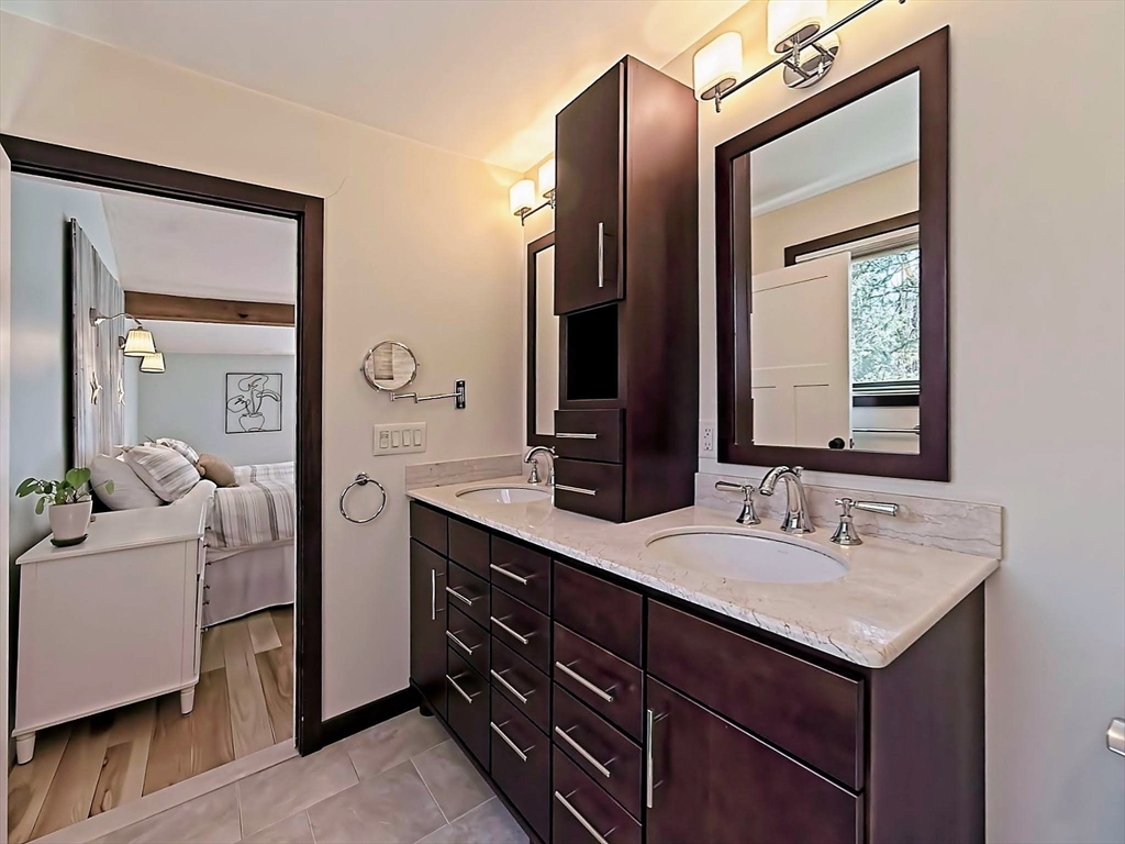 8 Fredrickson Road Norfolk, MA 02056 - Photo 31 of 39 a bathroom with a sink and a mirror