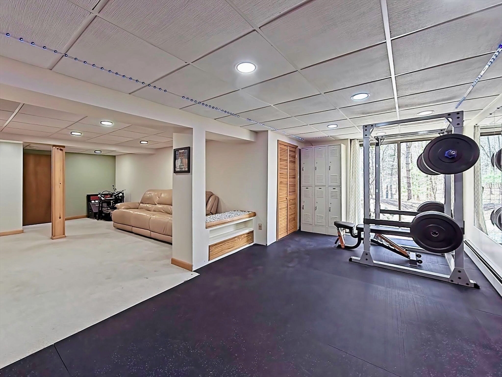8 Fredrickson Road Norfolk, MA 02056 - Photo 38 of 39 a view of livingroom with furniture and floor to ceiling window