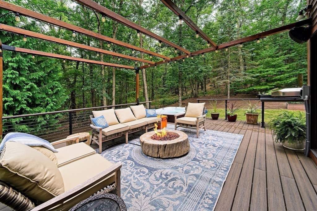 8 Fredrickson Road Norfolk, MA 02056 - Photo 5 of 39 a outdoor living space with furniture and garden view