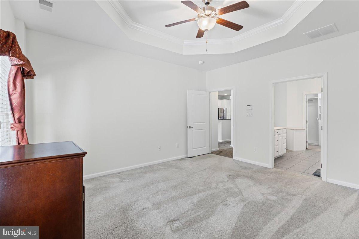 54 Heals Farm Road Burlington, NJ 08016 - Photo 15 of 26 a view of an empty room with a chandelier fan