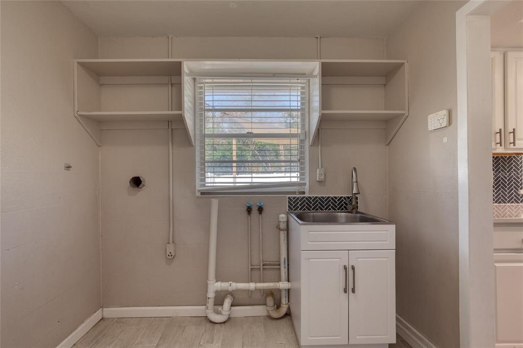 51 Rivocean Drive Ormond Beach, FL 32176 - Photo 21 of 65 a room with storage and utility