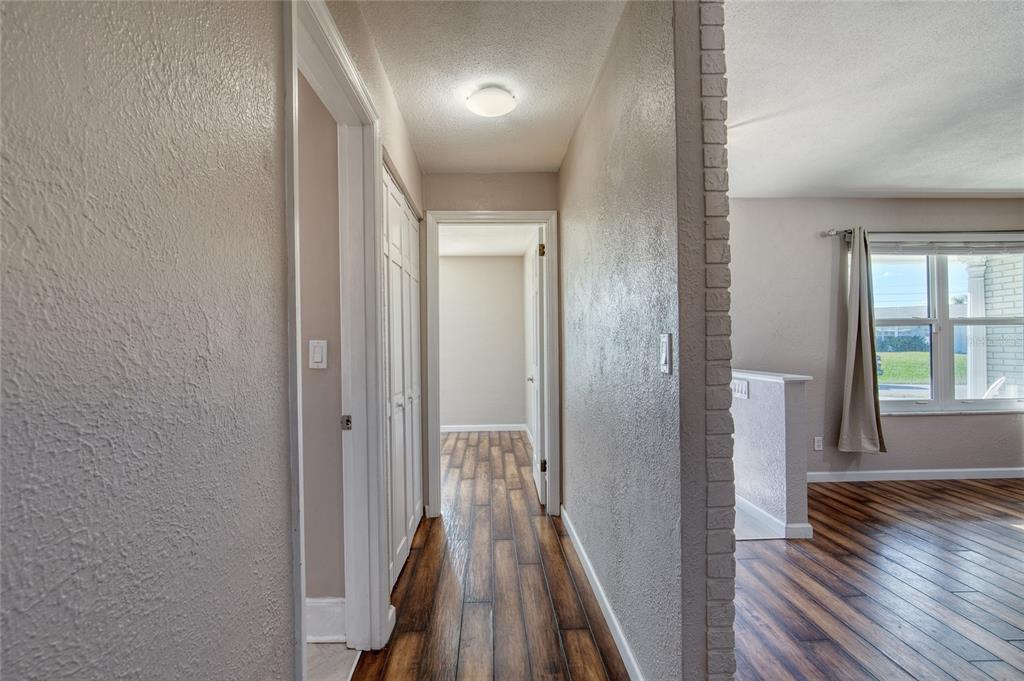 51 Rivocean Drive Ormond Beach, FL 32176 - Photo 22 of 65 a view of hallway with wooden floor