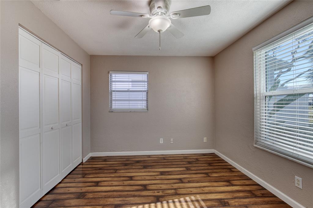 51 Rivocean Drive Ormond Beach, FL 32176 - Photo 24 of 65 a view of empty room with window and wooden floor