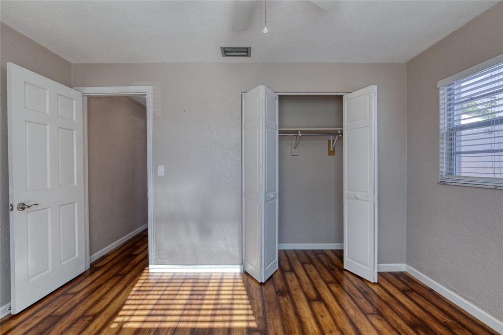 51 Rivocean Drive Ormond Beach, FL 32176 - Photo 25 of 65 a view of a room with wooden floor and a bathroom