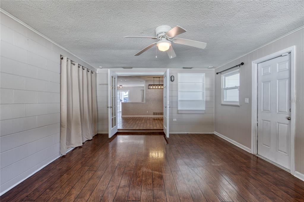 51 Rivocean Drive Ormond Beach, FL 32176 - Photo 35 of 65 an empty room with wooden floor closet and windows