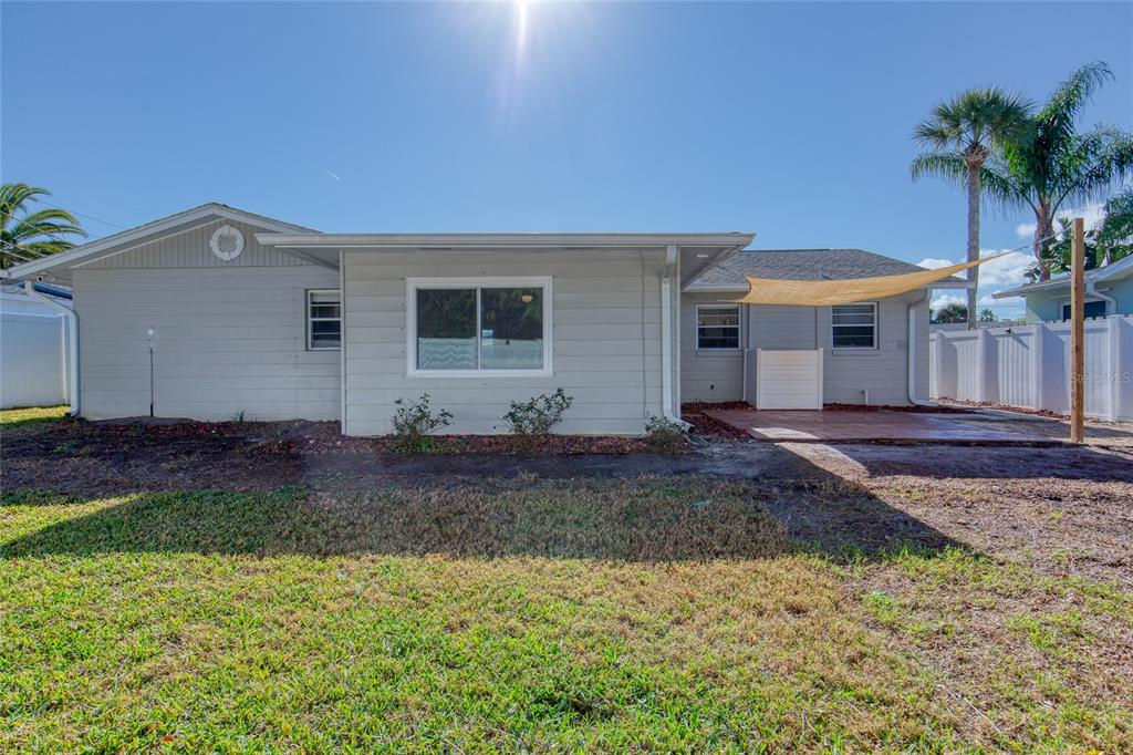 51 Rivocean Drive Ormond Beach, FL 32176 - Photo 53 of 65 a view of a house with a patio