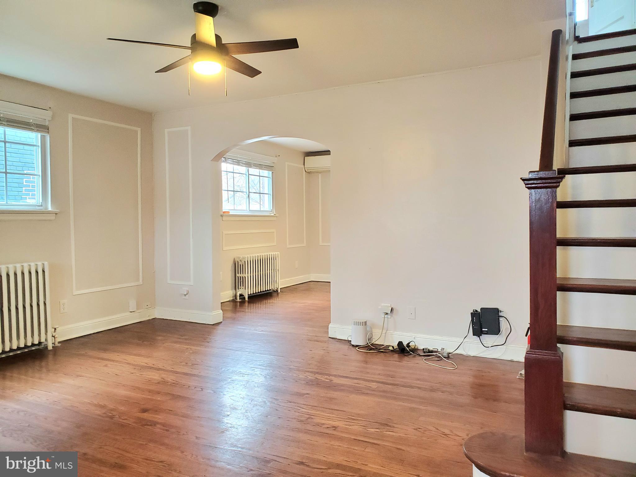 30 53rd Street Southeast Washington, DC 20019 - Photo 11 of 32 wooden floor in an empty room with a window