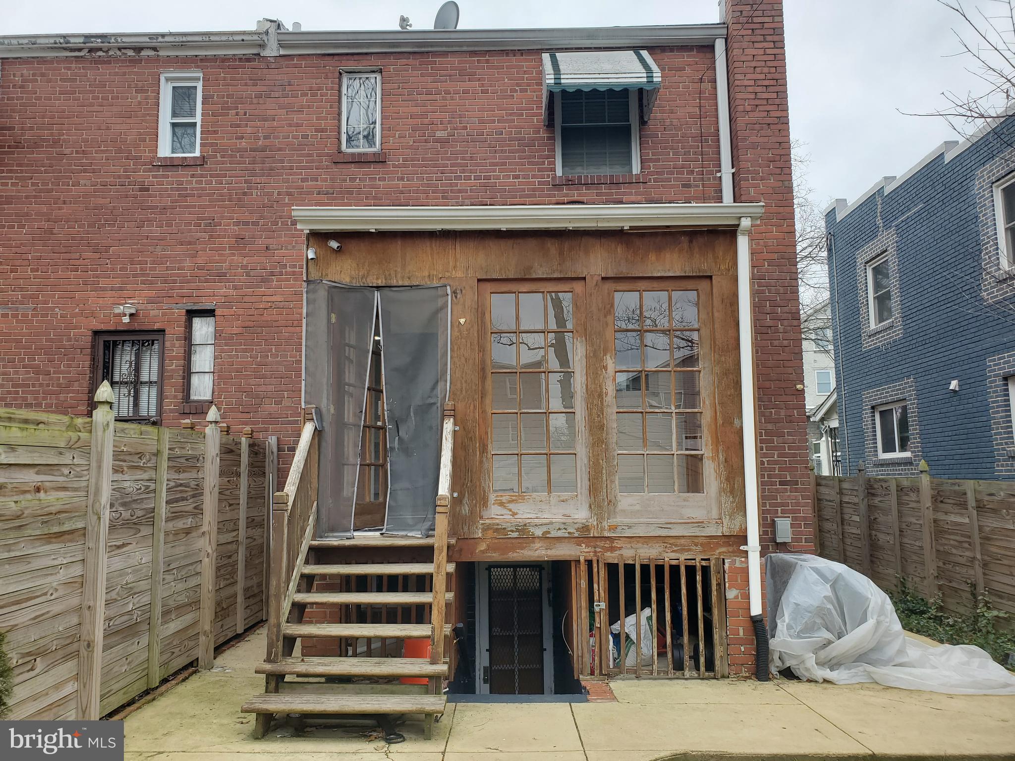 30 53rd Street Southeast Washington, DC 20019 - Photo 32 of 32 a front view of a house with a iron gate