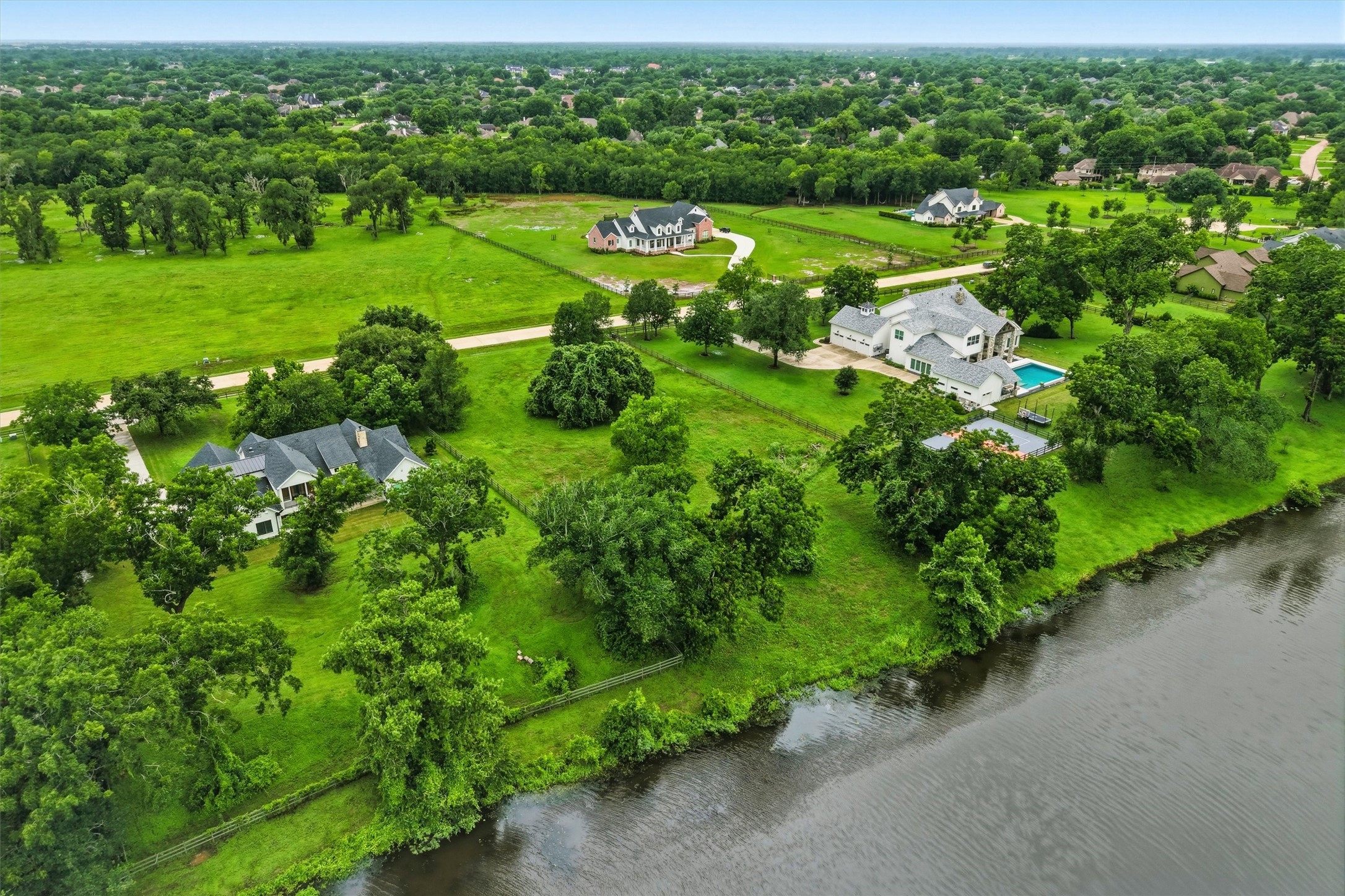 0 Riverlake Road Fulshear, TX 77441 - Photo 12 of 47 Characterized by mature trees, winding roads, scenic waterways, and expansive custom homesites, Fulbrook offers an unmatched blend of luxury, privacy, and small-town charm.