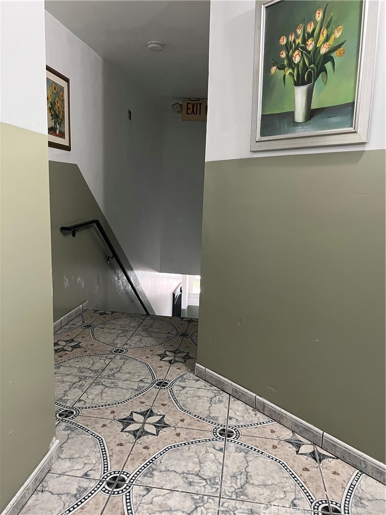 a view of wooden floor in a hallway