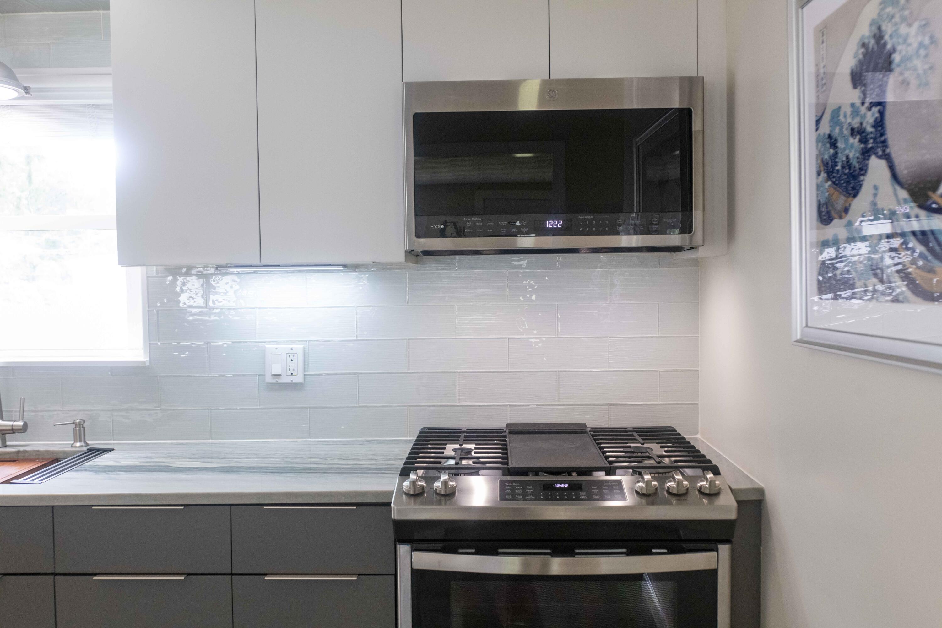 7 Arbeta Road Hyannis, MA 02601 - Photo 13 of 54 a stove top oven sitting inside of a kitchen